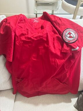 William Carey University Red Medical Scrub Top with Embroidered Patch